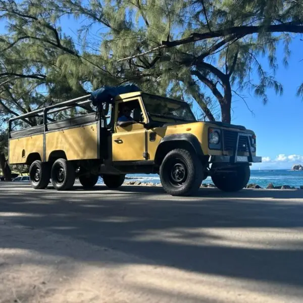 C&M safari vehicle by the sea